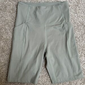 Girlfriend collective high-rise pocket bike shirt in AGAVE sz S EUC